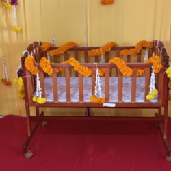 Cradle ceremony flower decoration